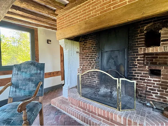 cheminée du gite pour 12 personnes la longere en normandie